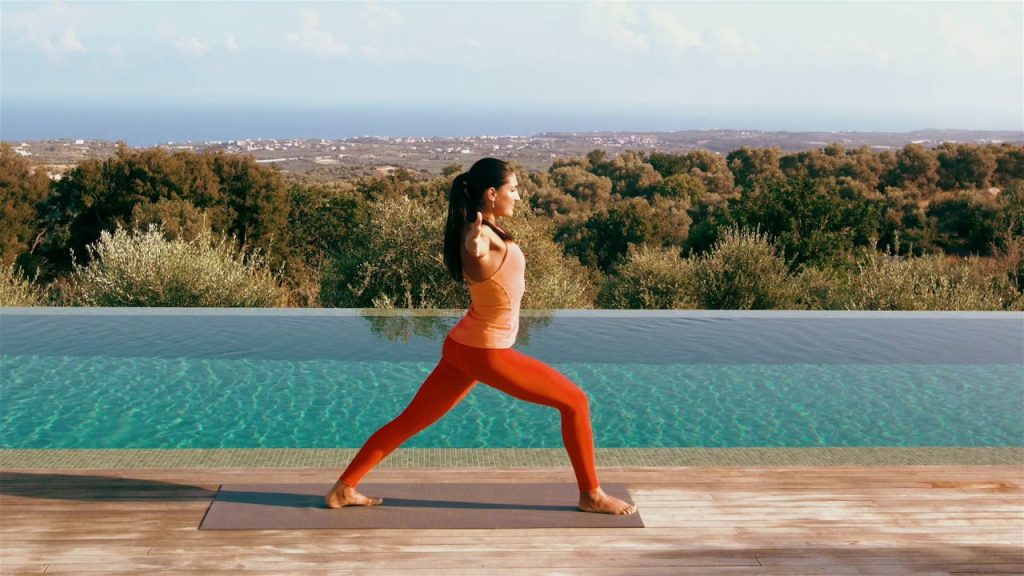 Tara in a yoga pose outside