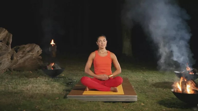 Tara sitting cross legged