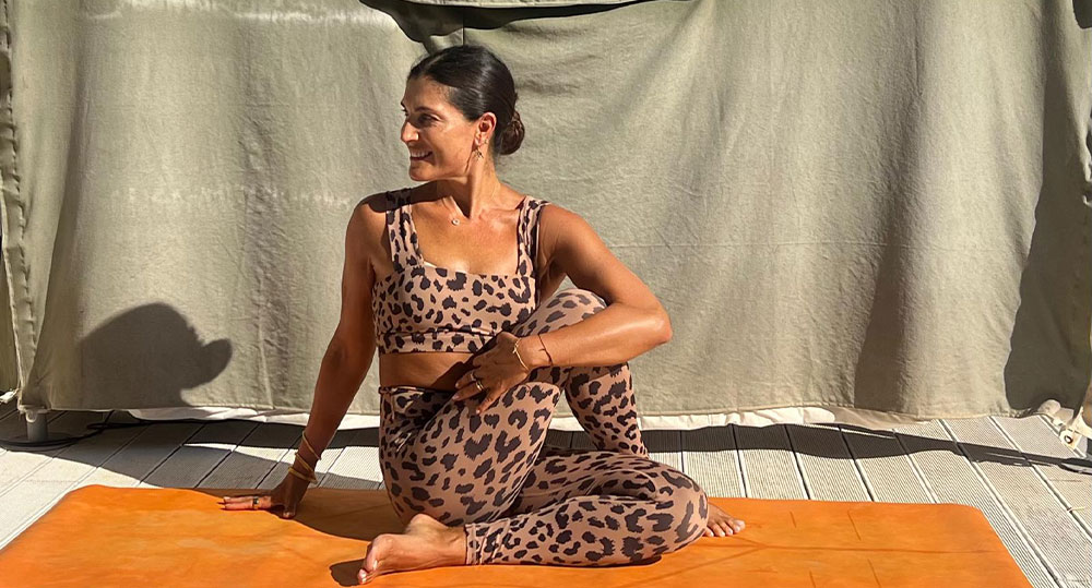 Tara in a yoga pose