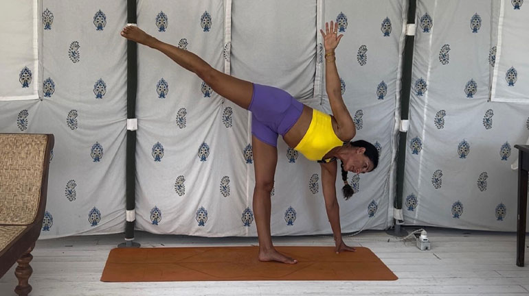 Tara in a yoga pose