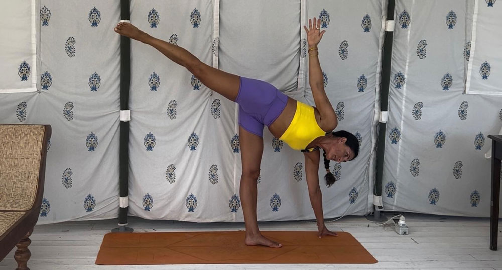 Tara in a yoga pose